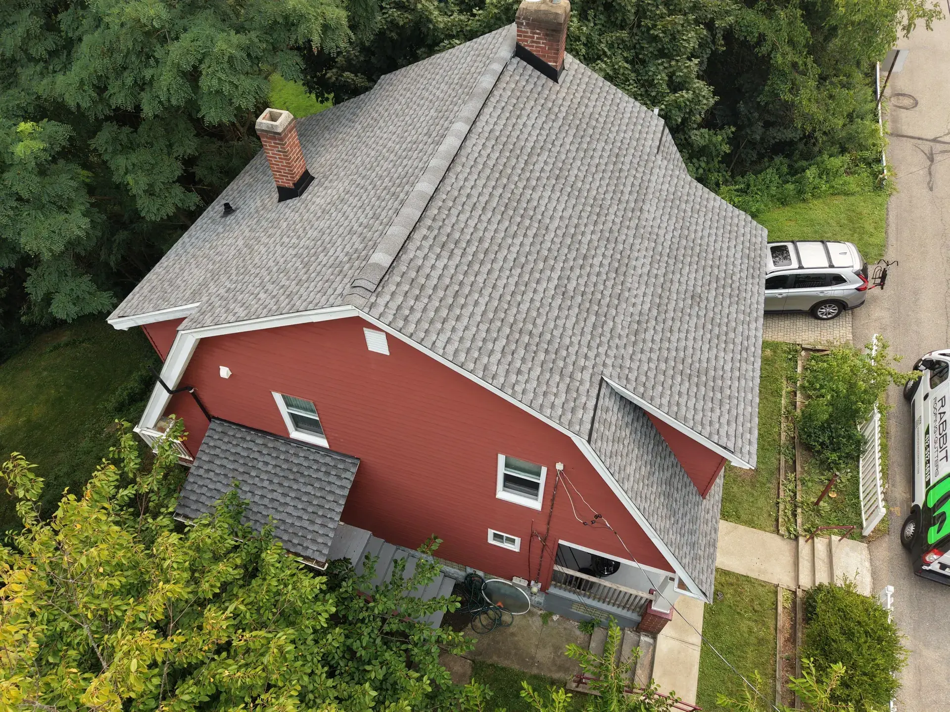 Standing-seam metal roofing panels installed on a residential home — photo 2